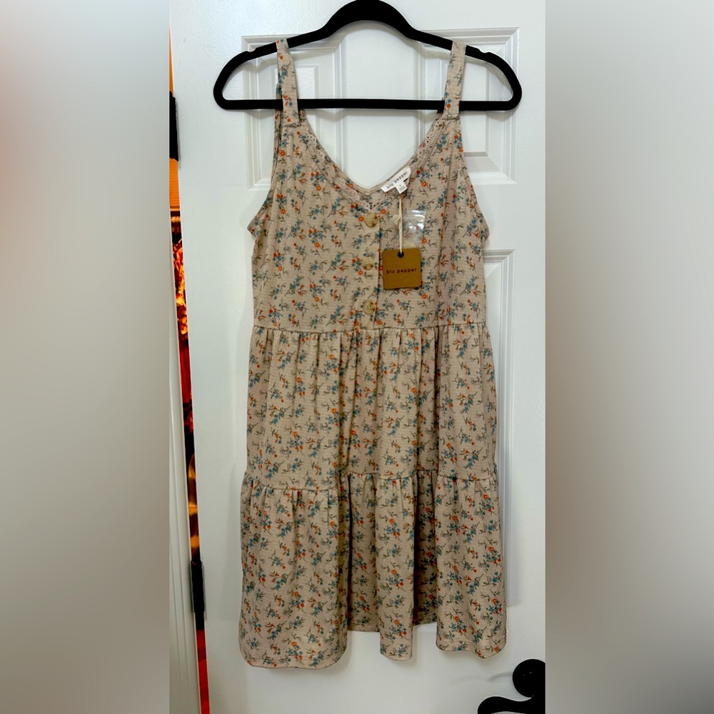 Brand new with tags, size large floral, mini dress.